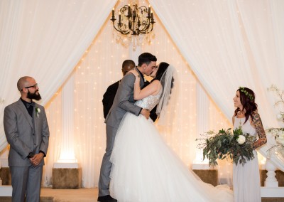 Villa Tuscana Reception Hall event showing indoor Wedding Ceremony Kiss the Bride