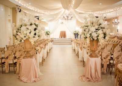 Villa Tuscana Reception Hall event showing Indoor Wedding Ceremony Light Pink Decorations