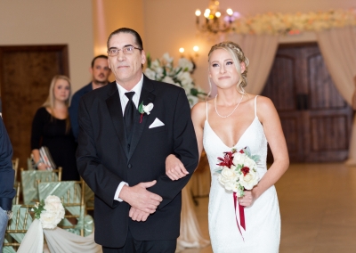 Villa Tuscana Reception Hall event showing bride coming down isle
