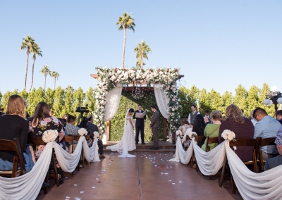 Villa Tuscana Reception Hall event showing Alejandra and Nathan outdoor wedding ceremony