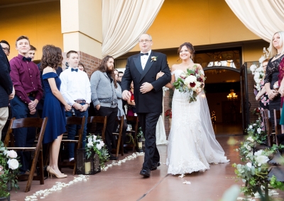 Villa Tuscana Reception Hall event showing father walking bride to be down wedding ceremony isle