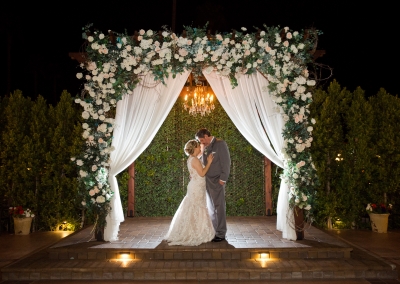 Villa Tuscana Reception Hall event showing outdoor wedding altar at night