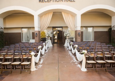 Villa Tuscana Reception Hall event showing outdoor ceremony seating set up