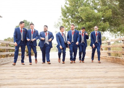 Villa Tuscana Reception Hall in mesa showing nearby park area with groomsmen on bridge